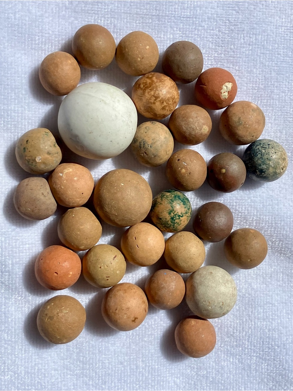Antique 30 pc collection of clay marbles